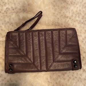 Linea Pelle double zipper clutch